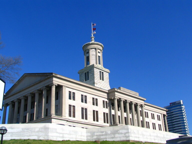 A majestic Tennessee State Capitol building with grand columns standing tall.